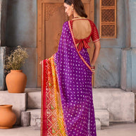 Purple bandhani printed silk blend saree festive wear