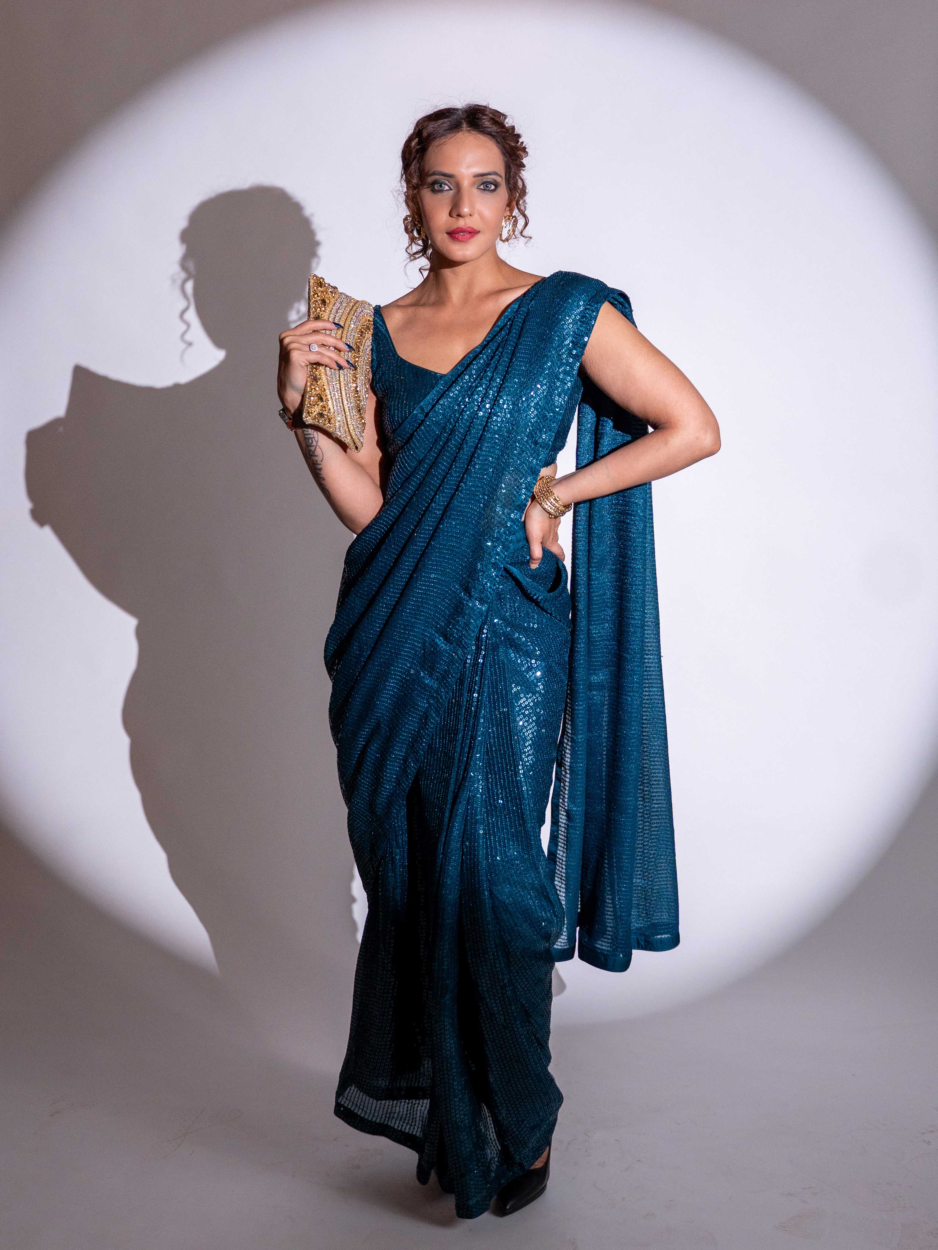 Blue sequin embroidered georgette saree festive wear