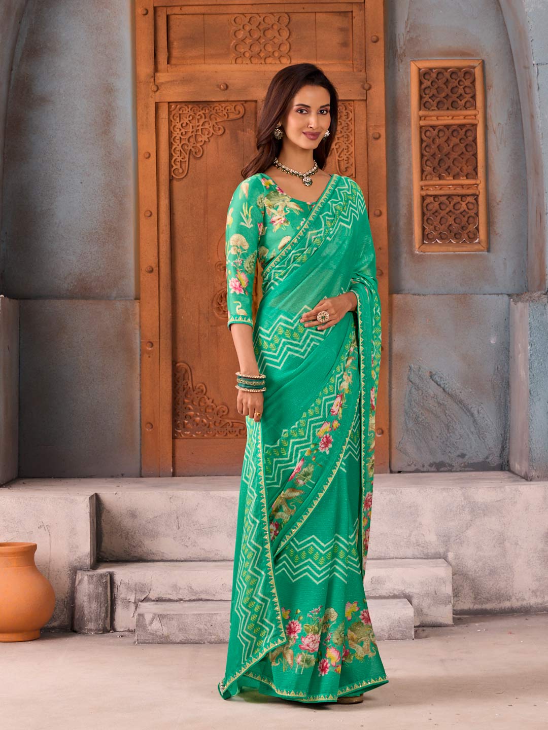 Green geometric and floral printed chiffon saree festive wear