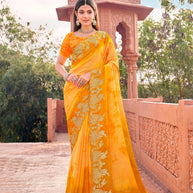 Yellow chiffon floral embroidered saree with heavy border