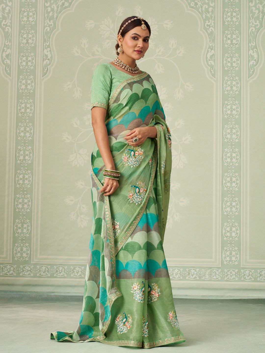 Green embroidered chiffon saree casual wear