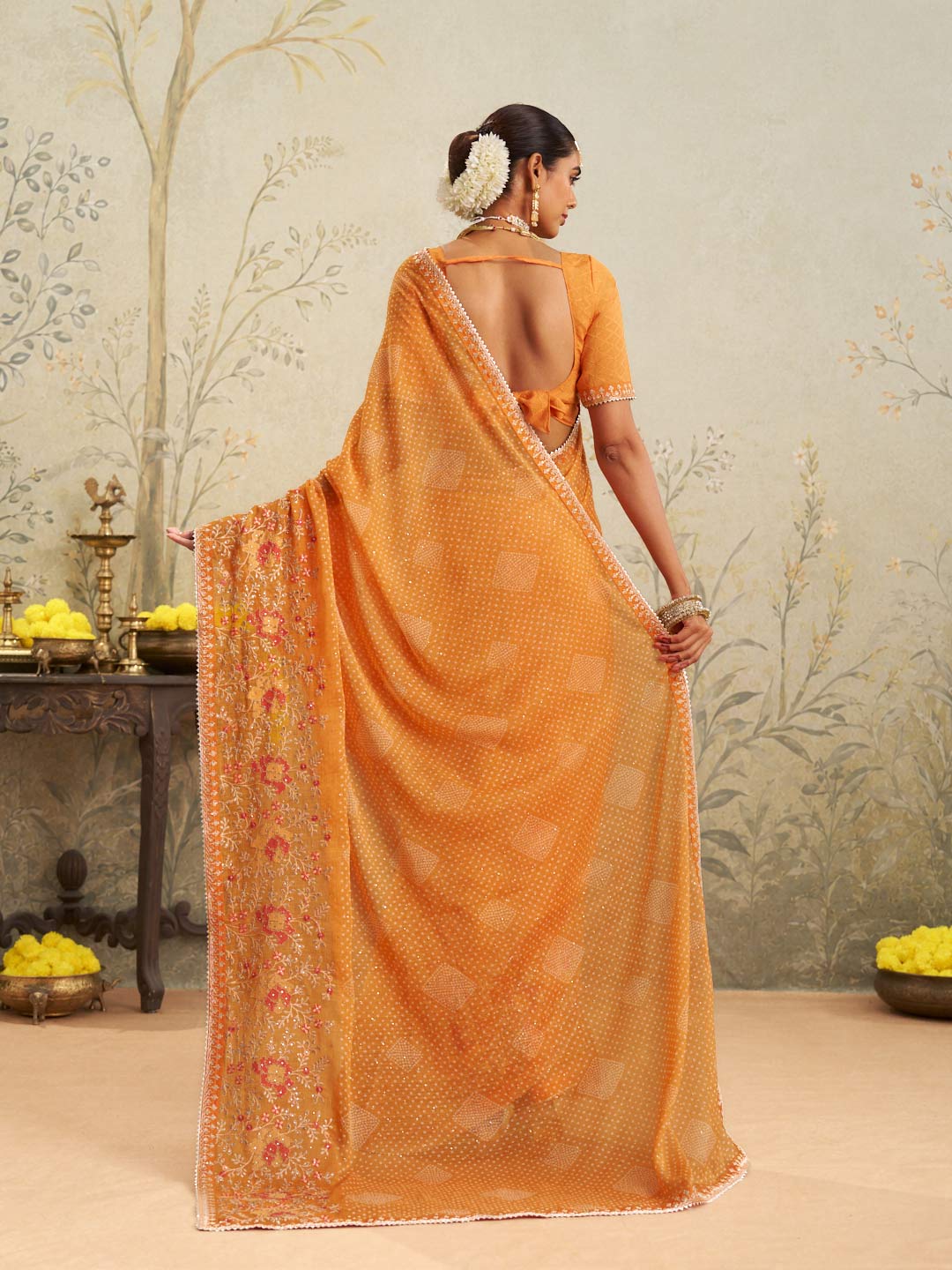Orange floral embroidered chiffon saree festive wear