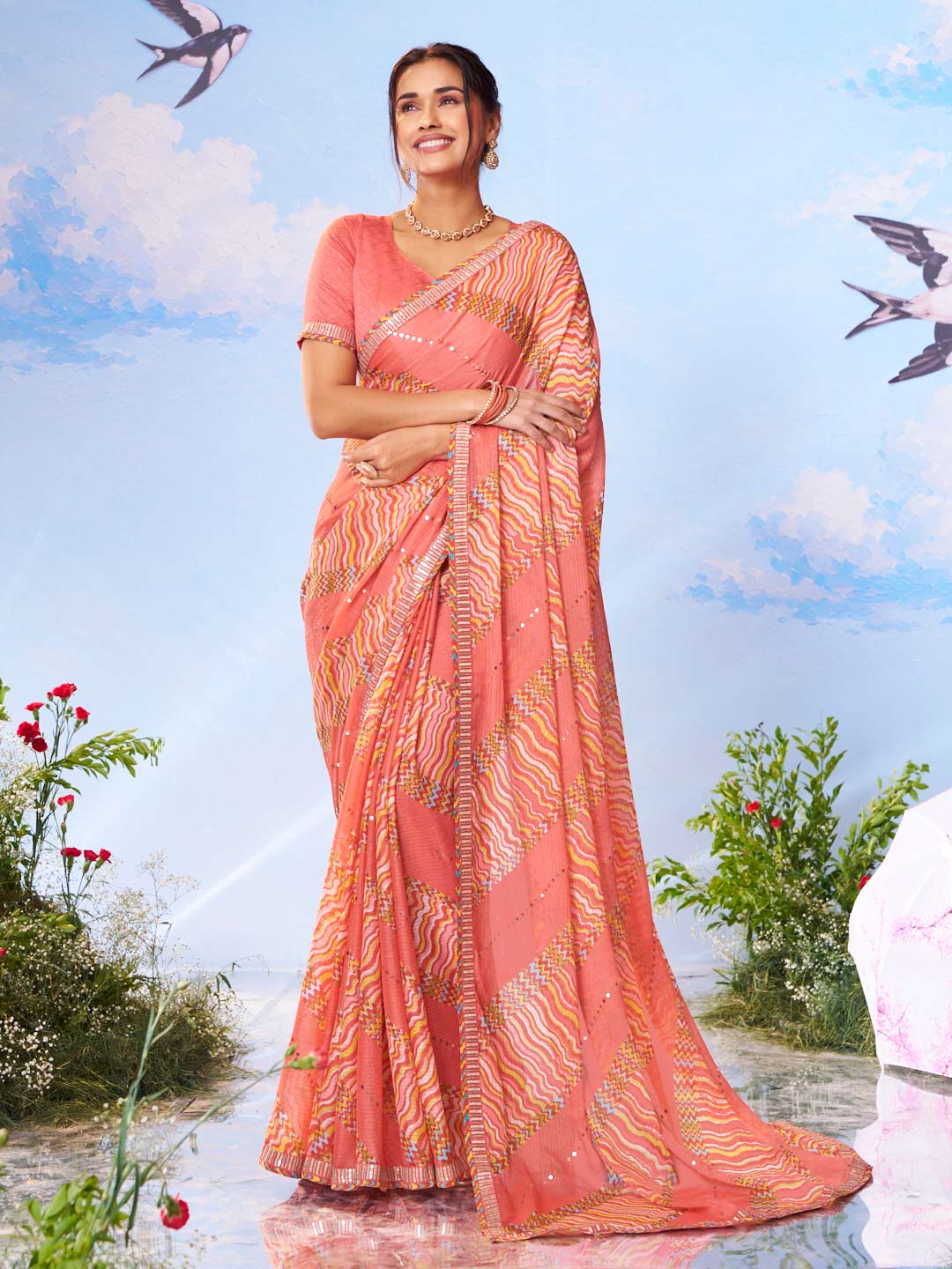 Orange geometric printed chiffon saree festive wear 