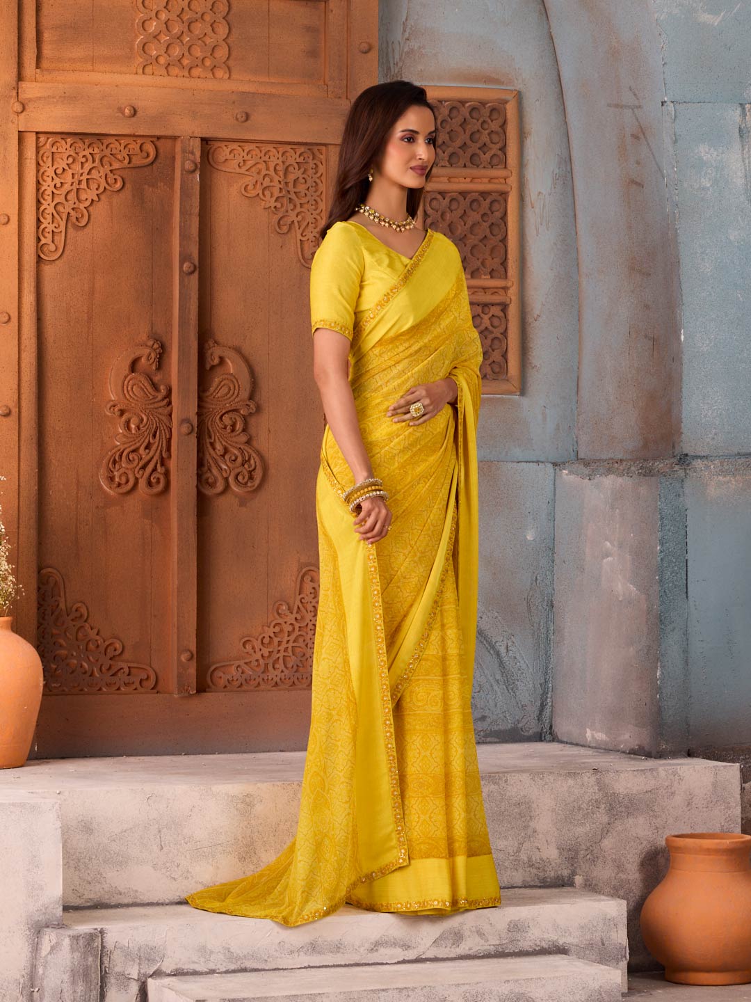 Yellow floral printed georgette saree casual wear