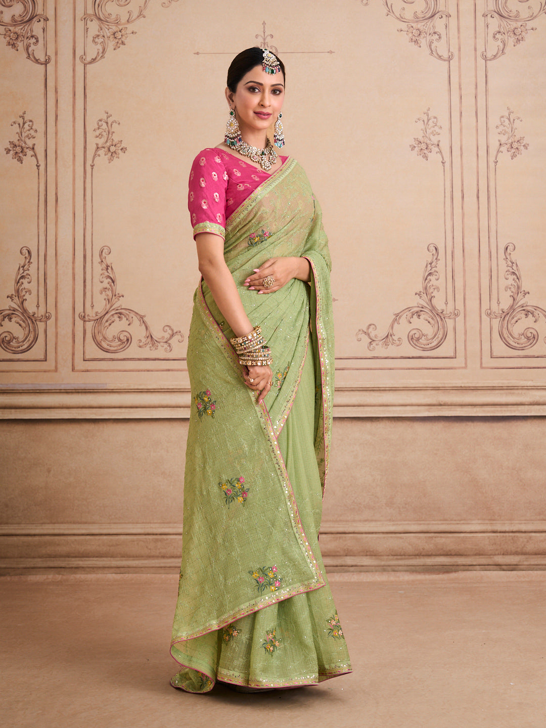 Green embroidered chiffon saree wedding wear