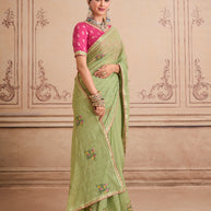 Green embroidered chiffon saree wedding wear
