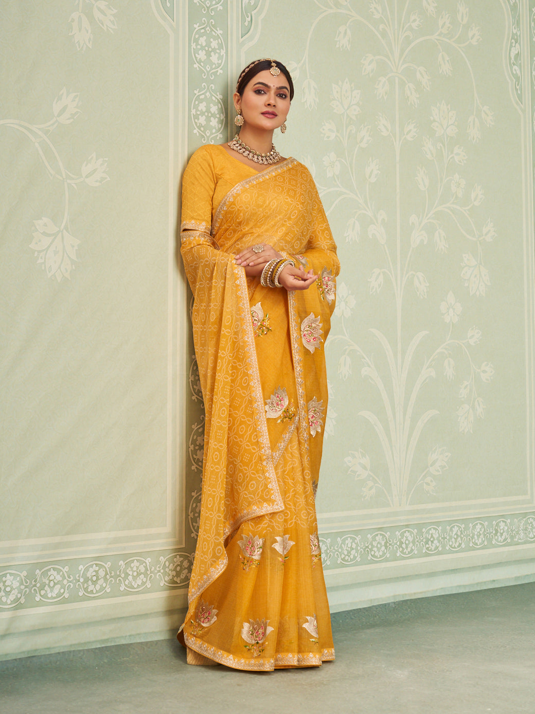 Yellow embroidered chiffon saree party wear