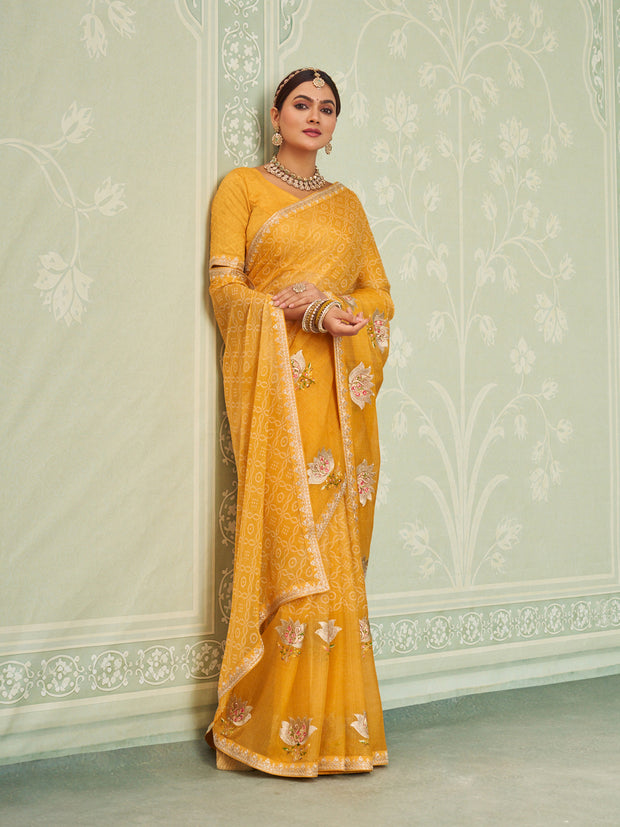 Yellow embroidered chiffon saree party wear