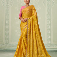 Yellow floral embroidered chiffon saree festive wear