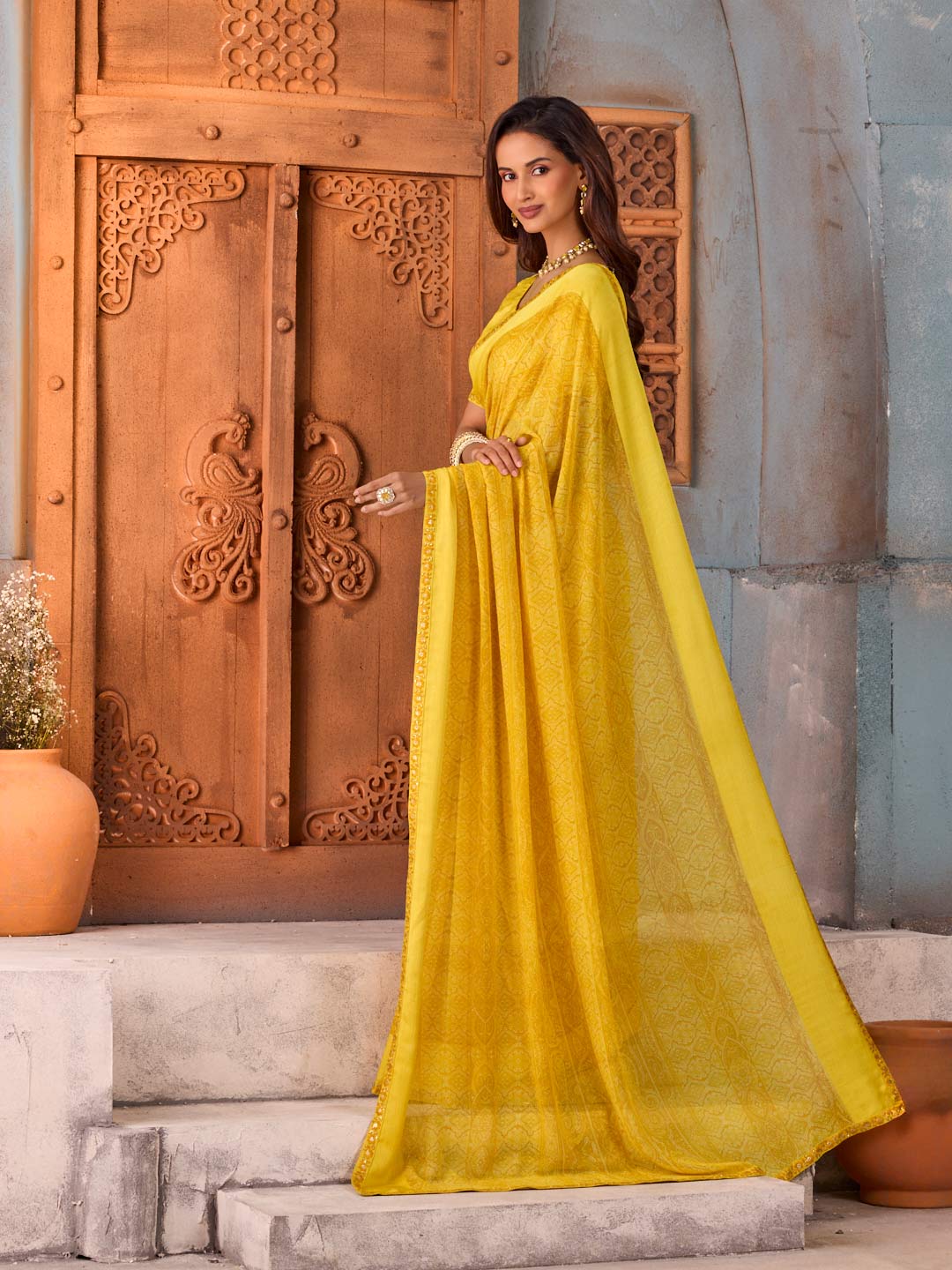 Yellow floral printed georgette saree festive wear