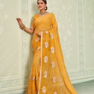 Yellow embroidered chiffon saree festive wear