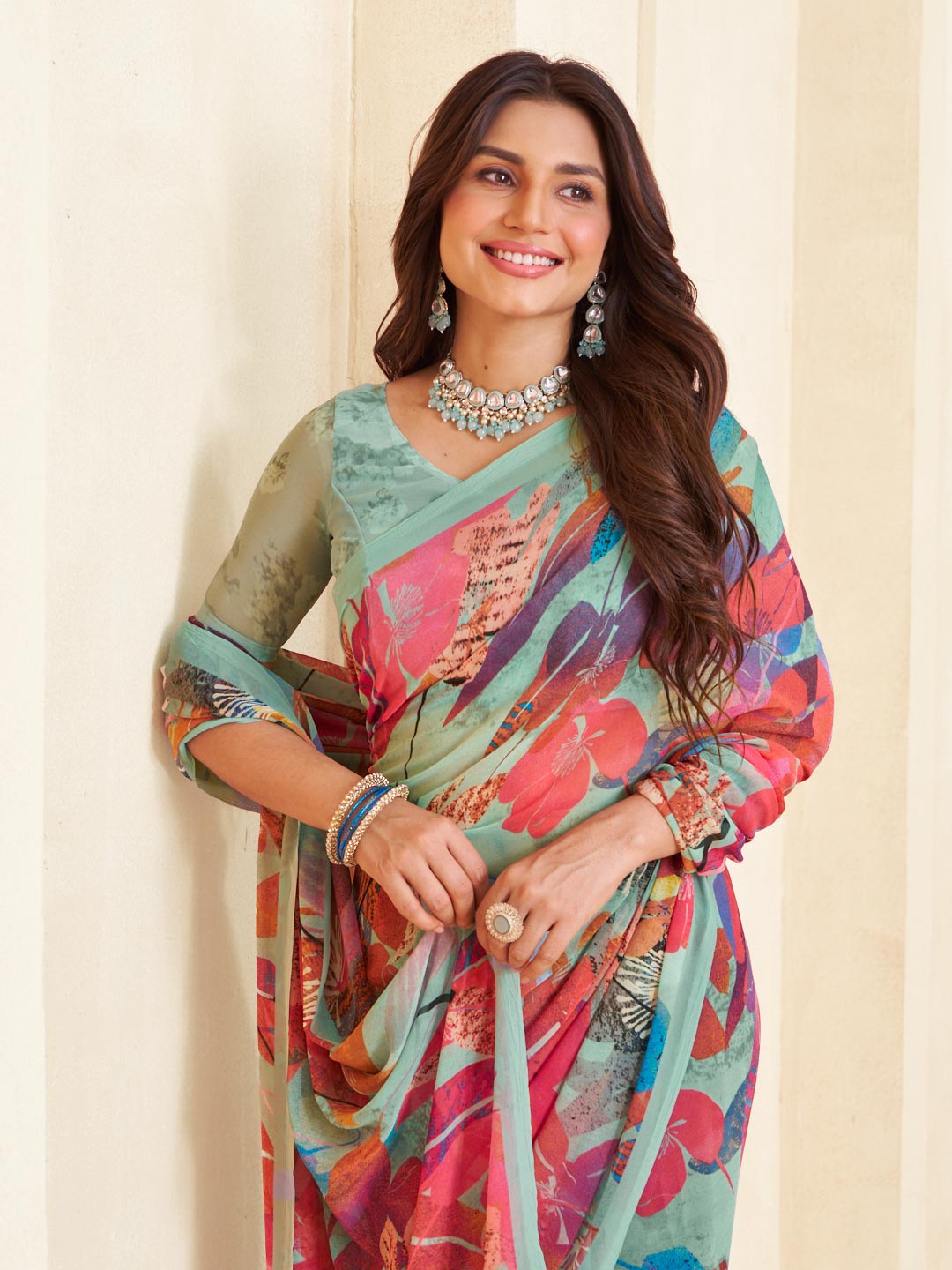 Teal floral georgette saree casual look