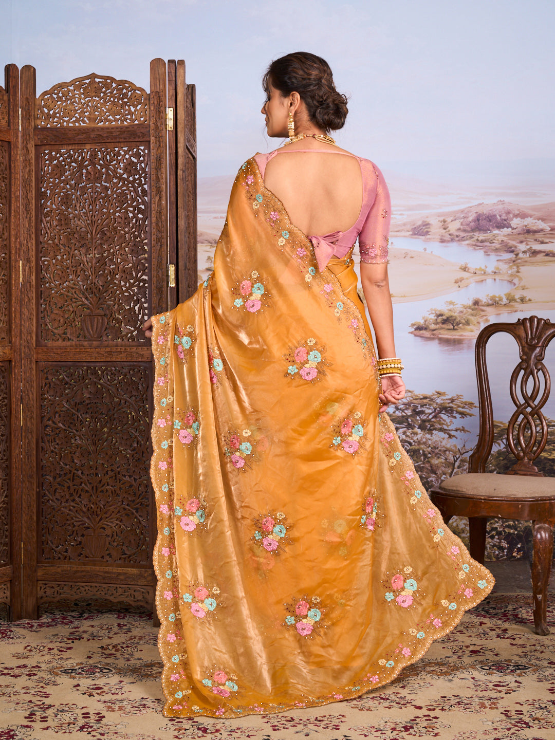 Orange floral embroidered chiffon saree festive wear