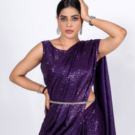 Purple sequin embroidered georgette saree wedding wear