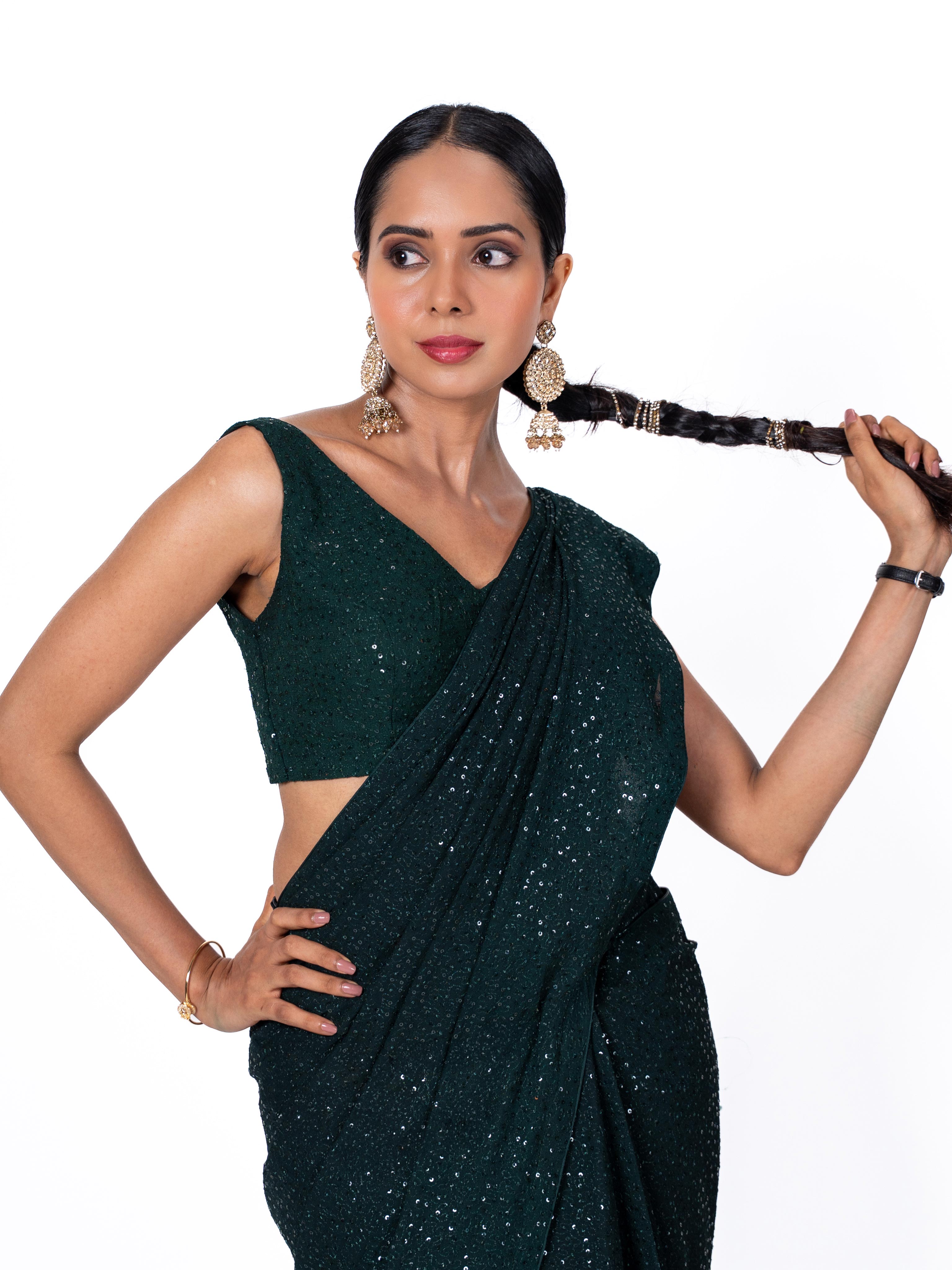 Green sequin embroidered georgette saree wedding wear