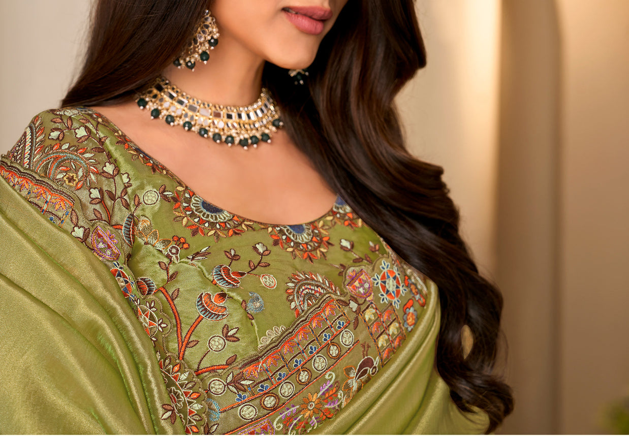 Green embroidered silk blend saree party wear