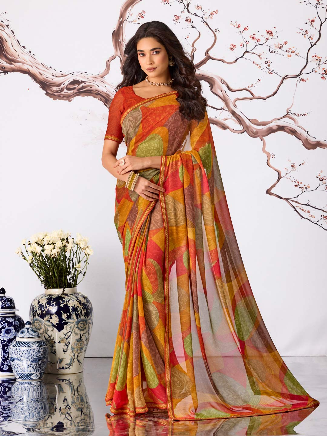 Orange abstract printed georgette saree party wear
