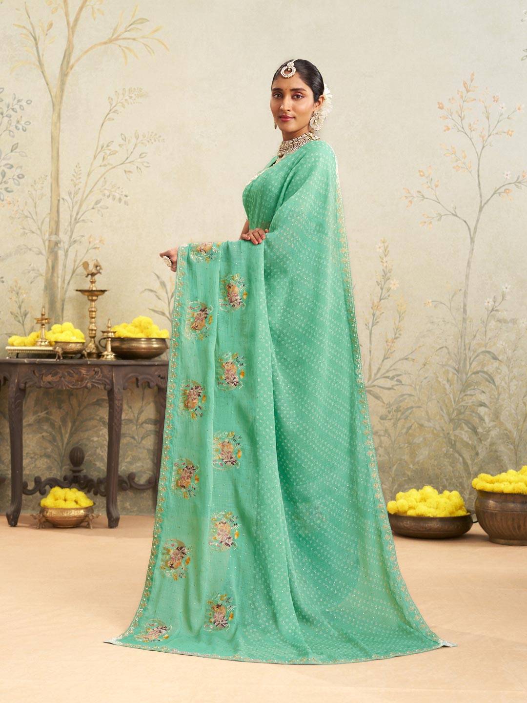 Green embroidered chiffon saree festive wear
