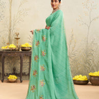 Green embroidered chiffon saree festive wear