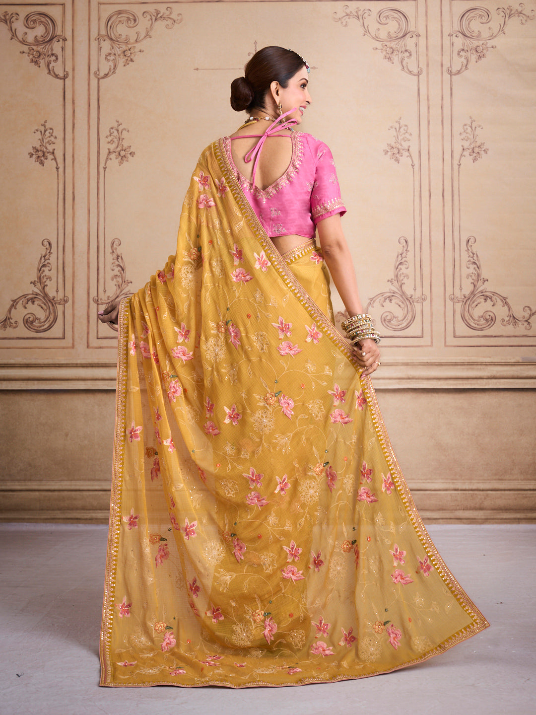 Yellow embroidered tissue organza saree party wear