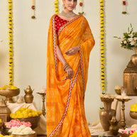 Orange bandhani printed georgette saree wedding wear