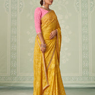 Yellow floral embroidered chiffon saree casual wear