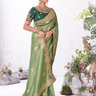 Green embroidered saree elegant style