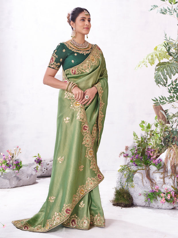 Green embroidered saree elegant style