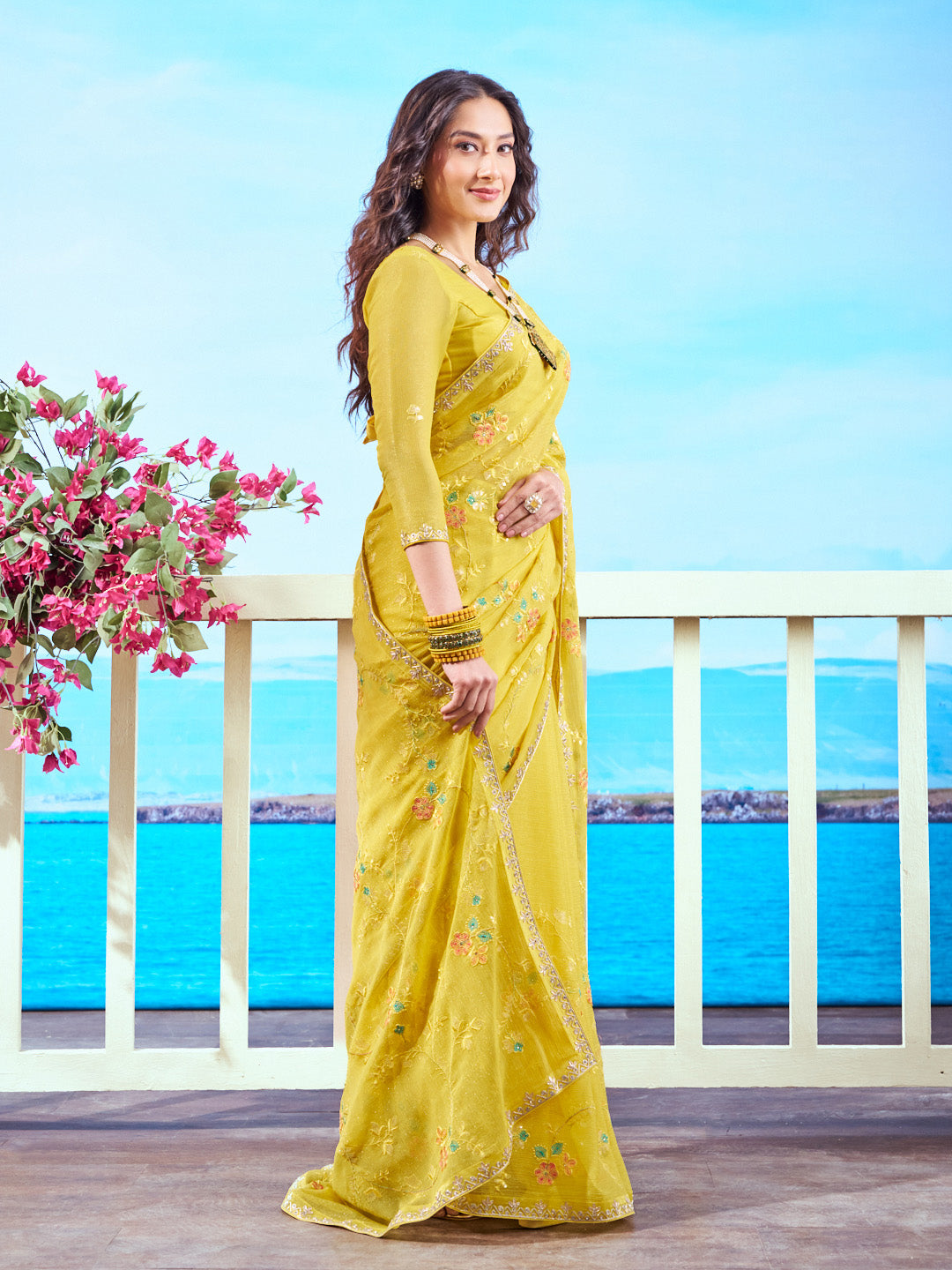 Yellow embellished chiffon saree wedding wear 
