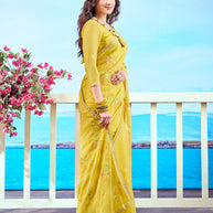 Yellow embellished chiffon saree wedding wear 