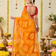 Orange bandhani printed georgette saree party wear