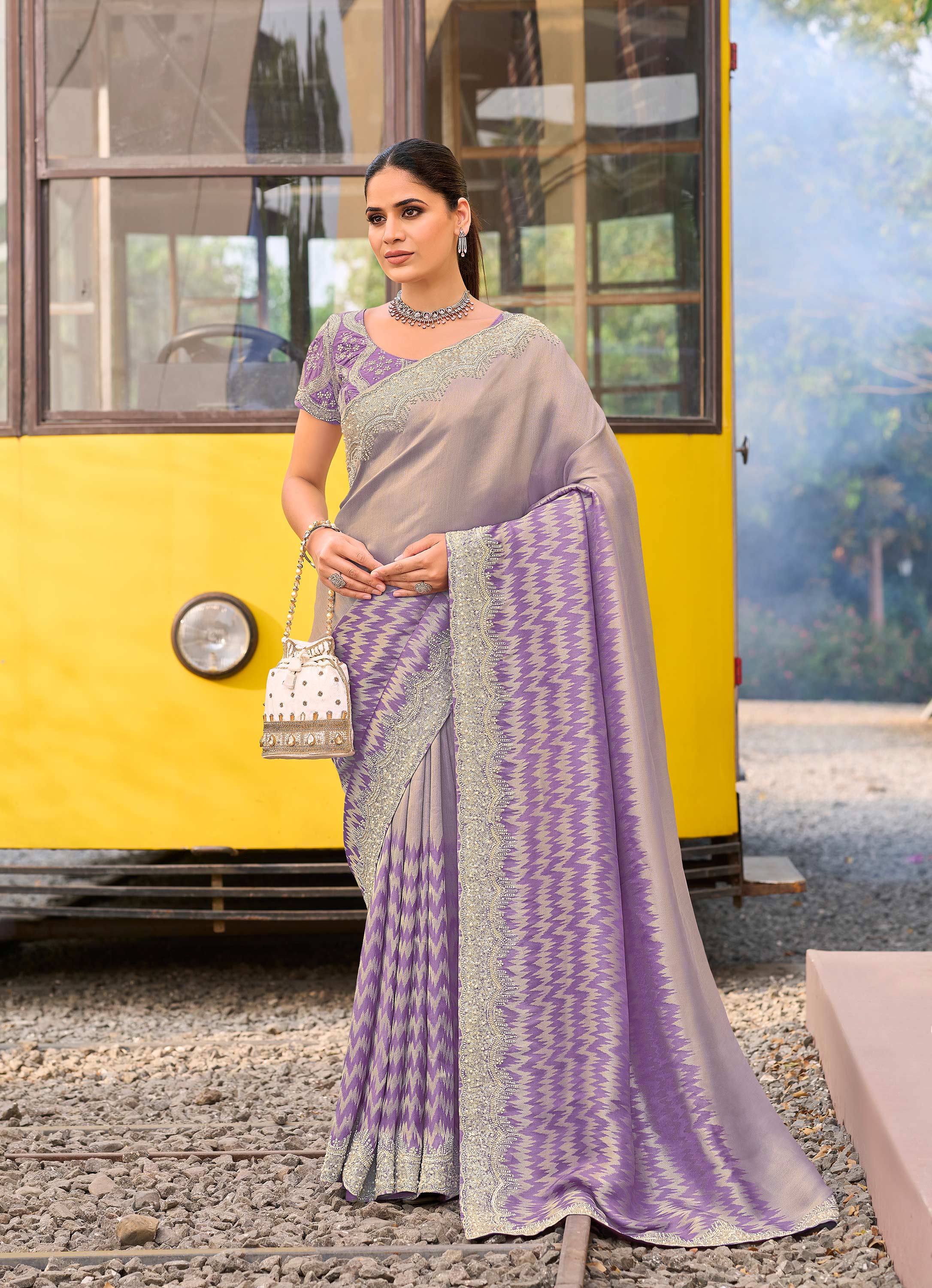 Purple silk blend embroidered saree