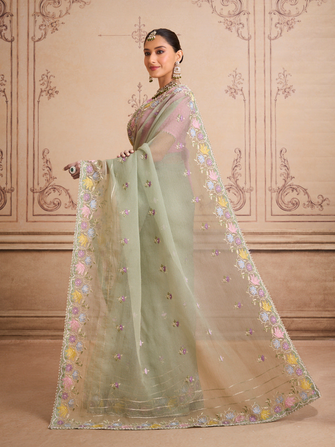 Green embroidered tissue organza saree wedding wear
