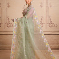 Green embroidered tissue organza saree wedding wear