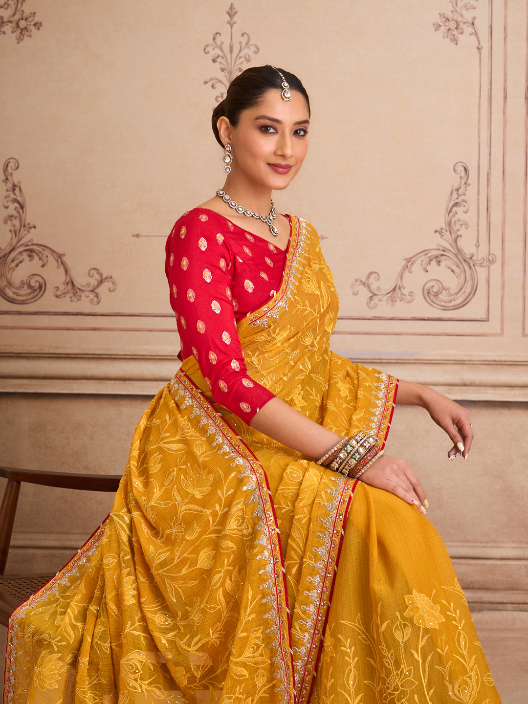Orange floral embroidered chiffon saree casual wear