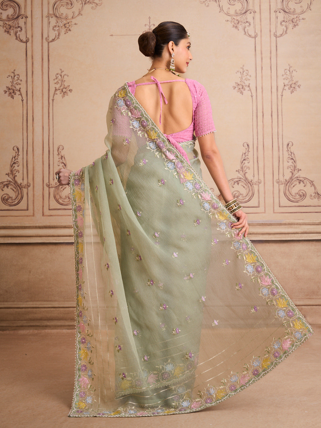 Green embroidered tissue organza saree party wear