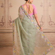 Green embroidered tissue organza saree party wear