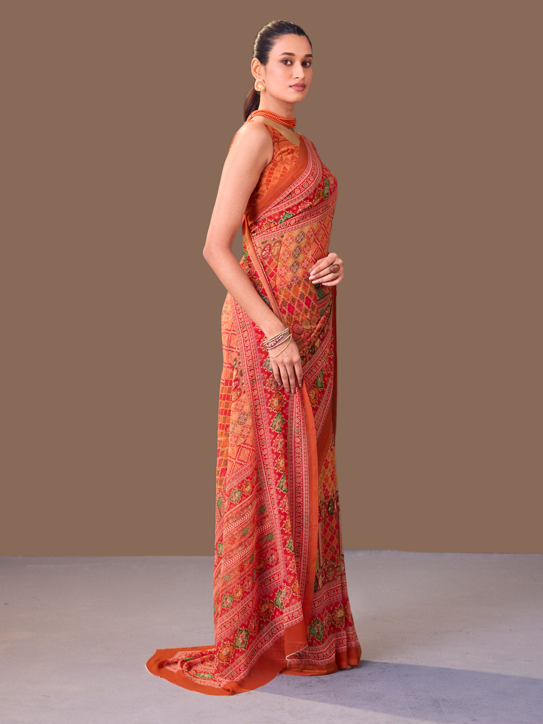 Laxmipati Dillagi Orange Georgette Floral Saree