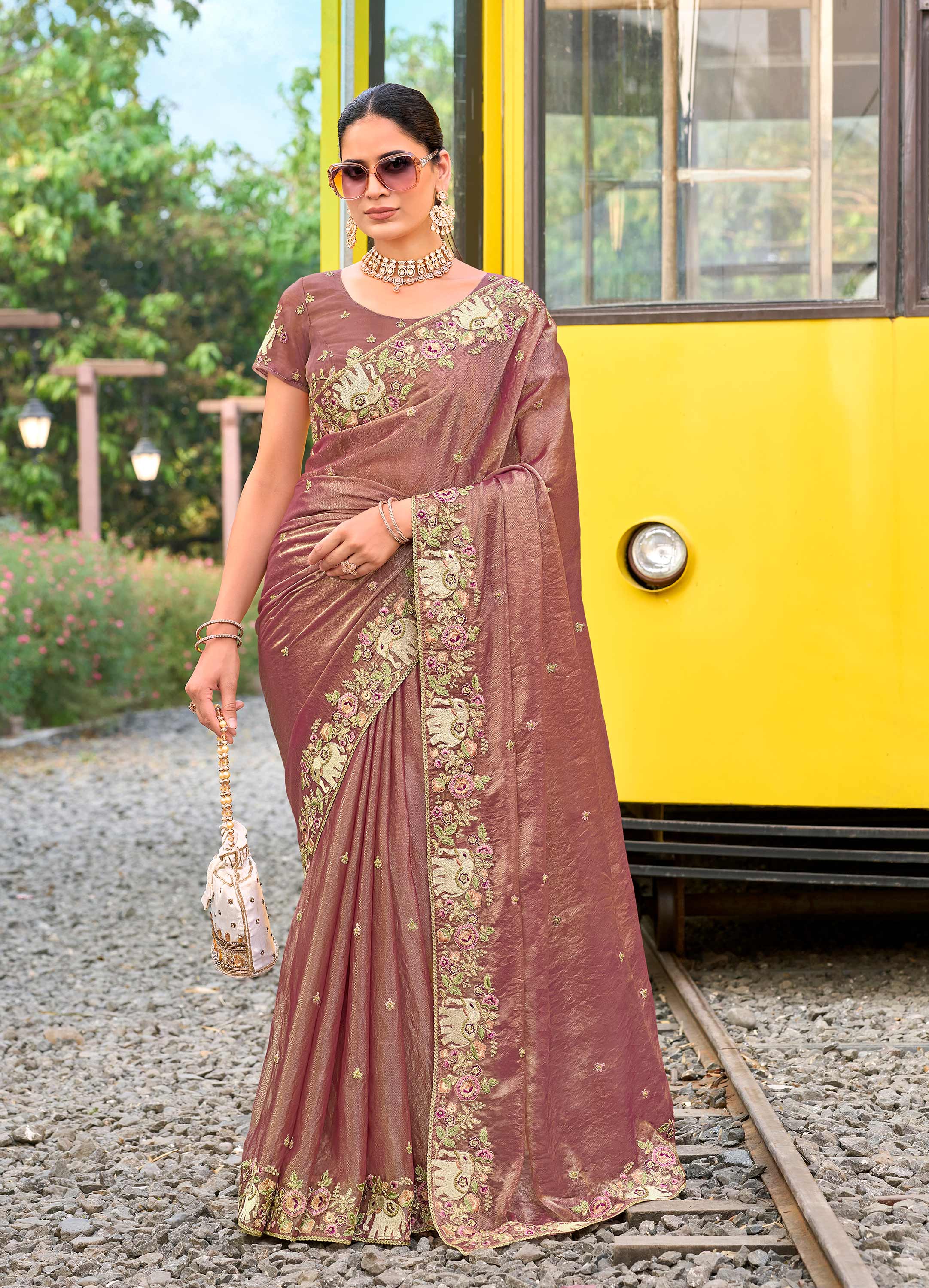 Purple chiffon elephant motif embroidered saree