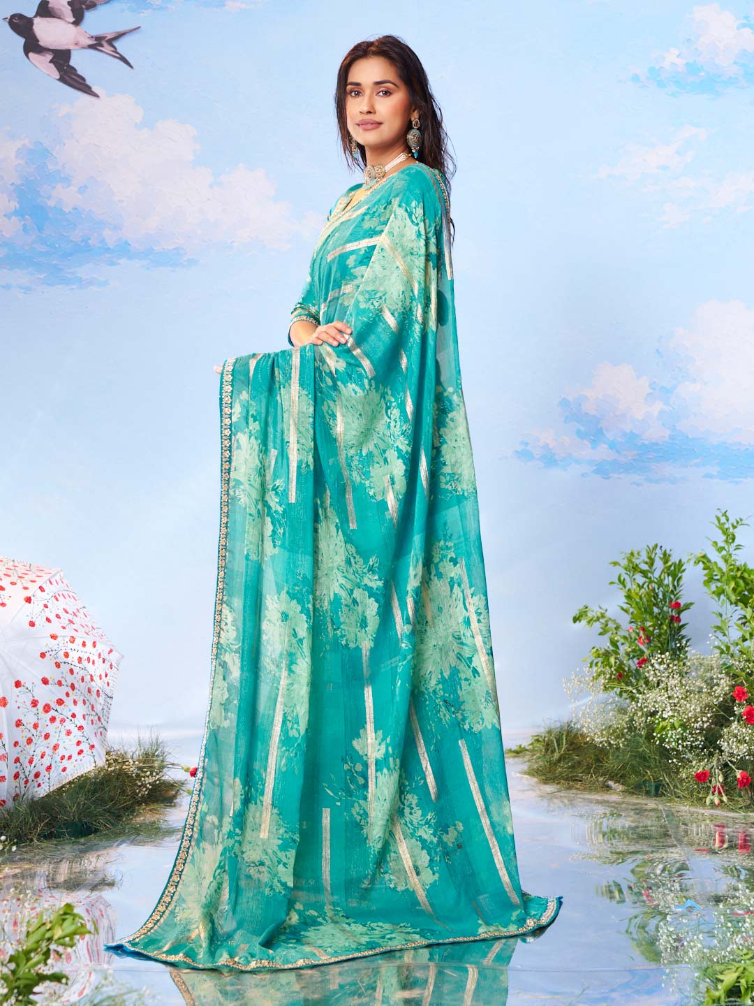 Blue floral printed chiffon saree festive wear