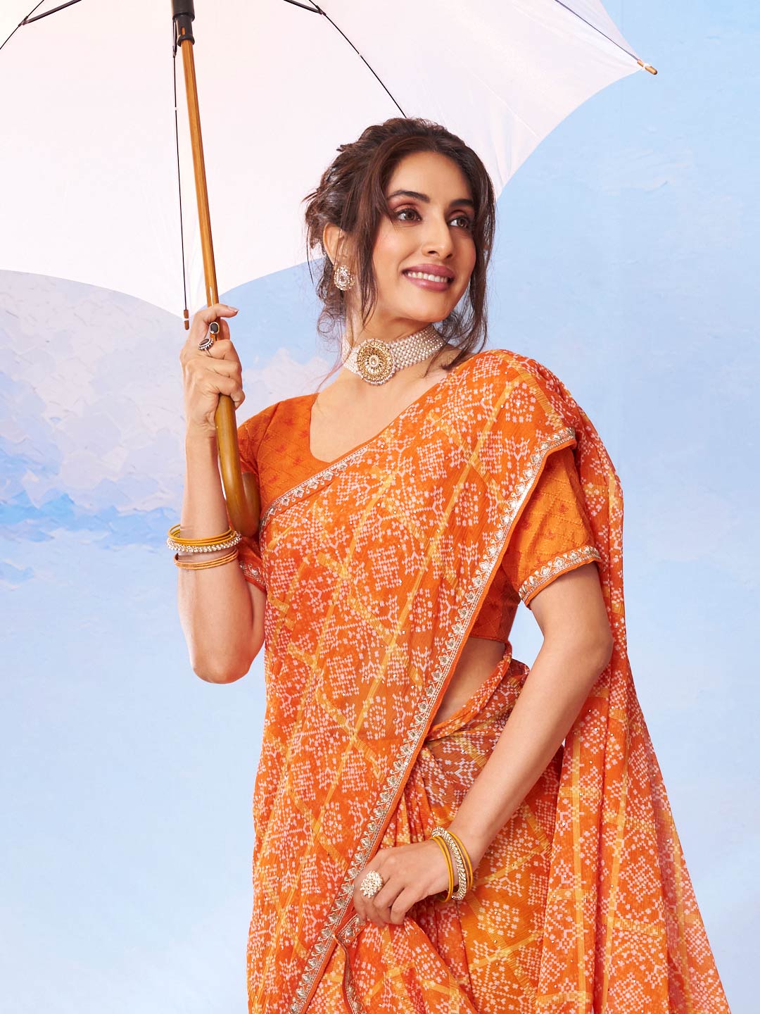 Orange printed silk saree party wear