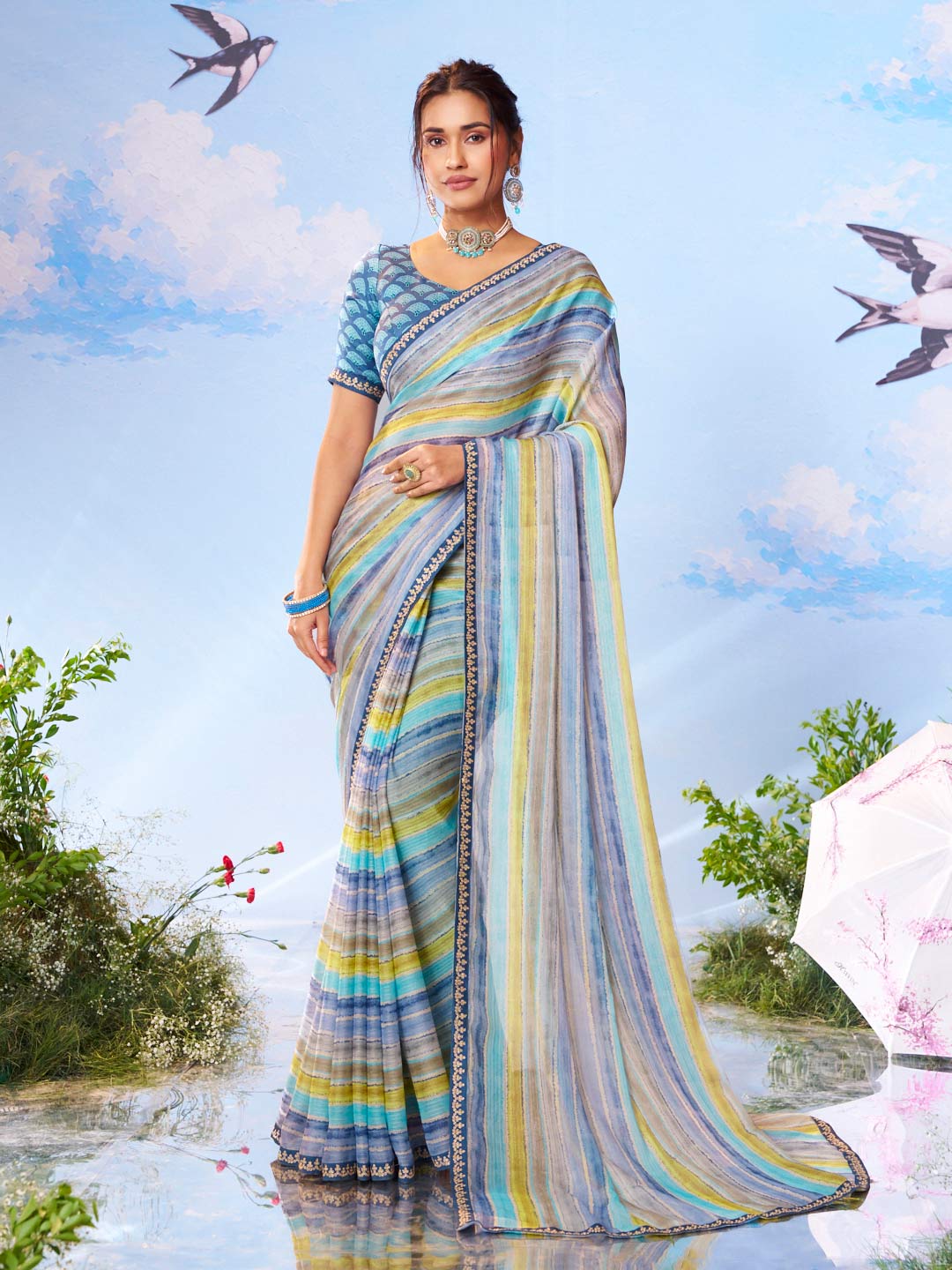 Blue embroidered georgette saree festive wear 