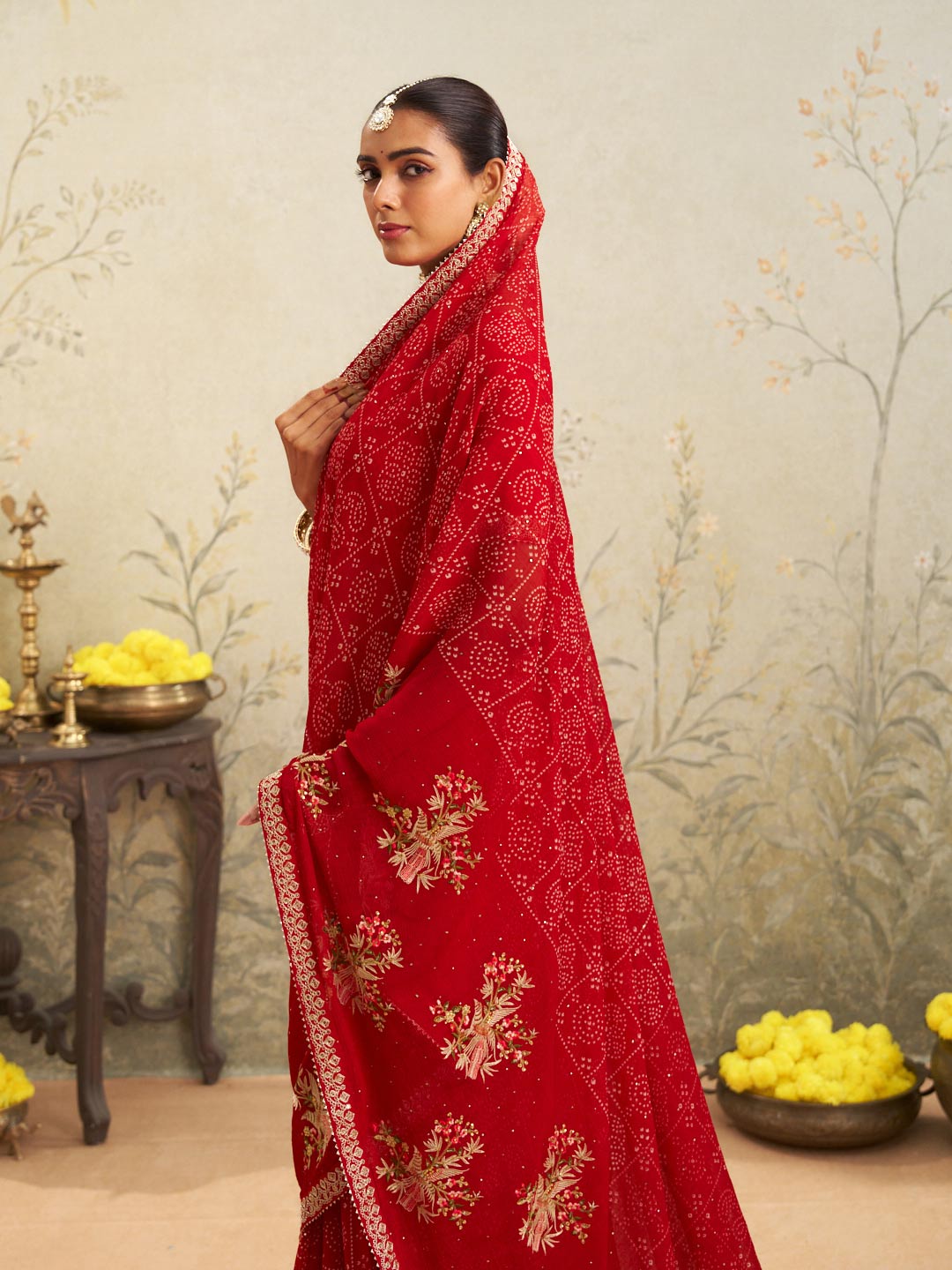 Red embroidered chiffon saree casual wear