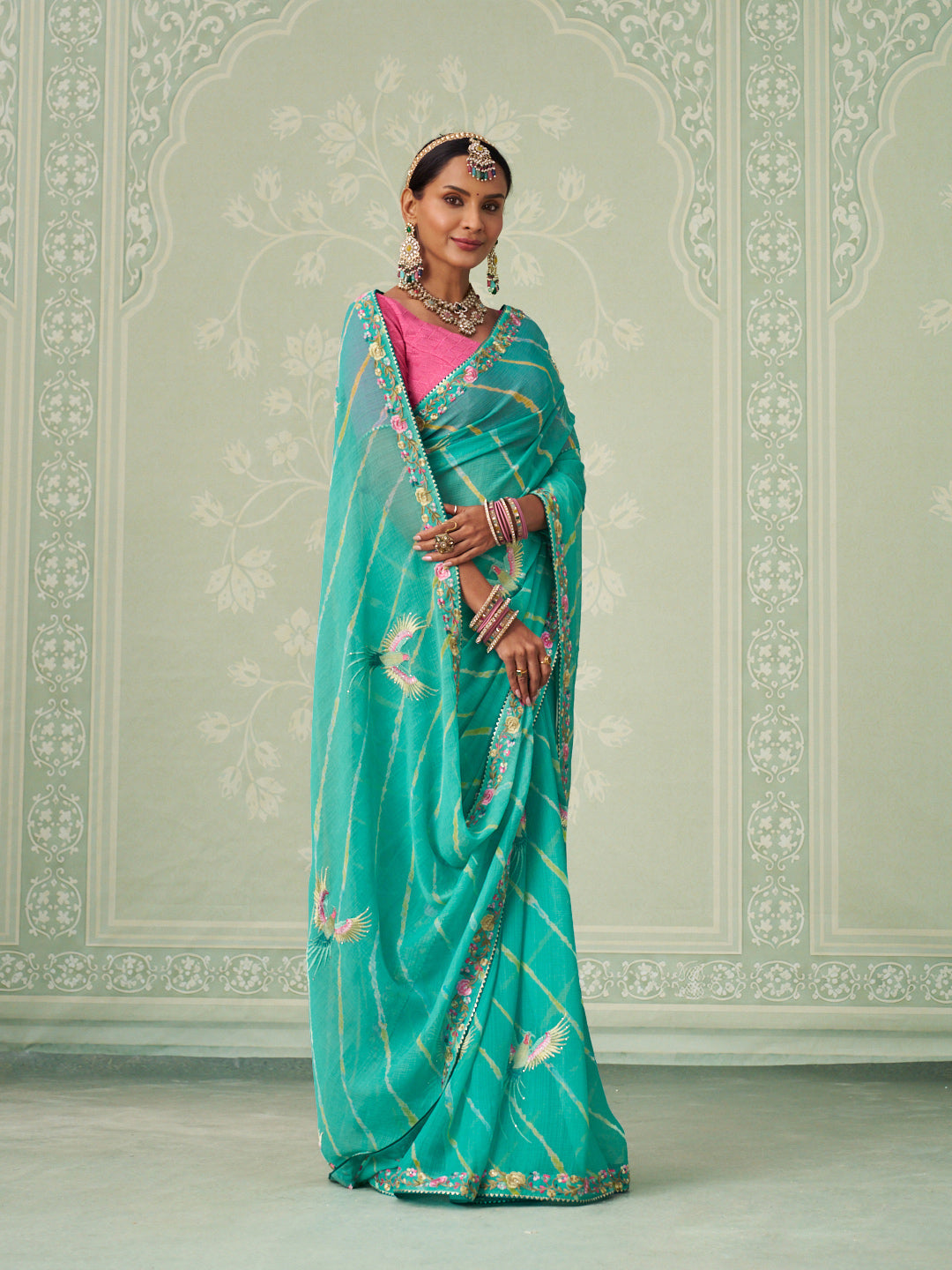 Green embroidered chiffon saree party wear