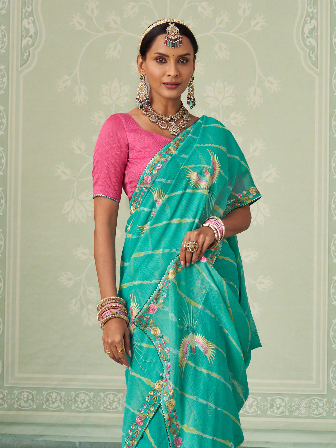 Green embroidered chiffon saree wedding wear