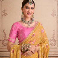 Yellow embroidered tissue organza saree casual wear