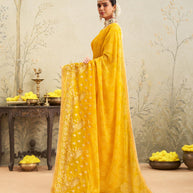 Yellow embroidered chiffon saree festive wear