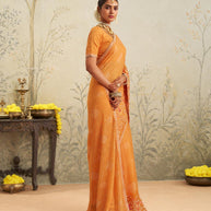 Orange floral embroidered chiffon saree wedding wear