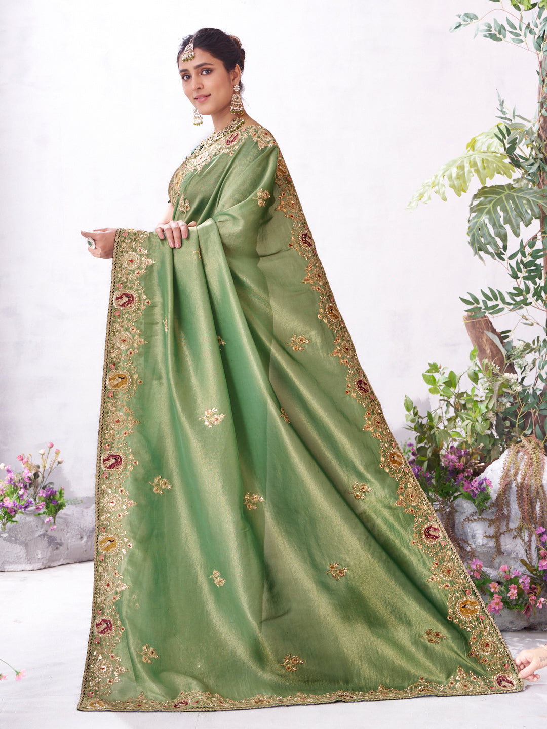 Green designer embroidery saree festive look