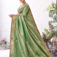 Green designer embroidery saree festive look